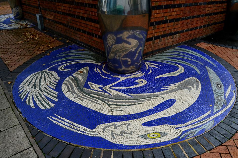 Anamorphic mosaics at bus station, designed by Steve Field.1994, laid by Ilona Bryan and Chris Willetts